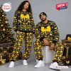 Front view of two models wearing Wu-Tang Clan Sweater and Jogger Pants Set with yellow holiday patterns.