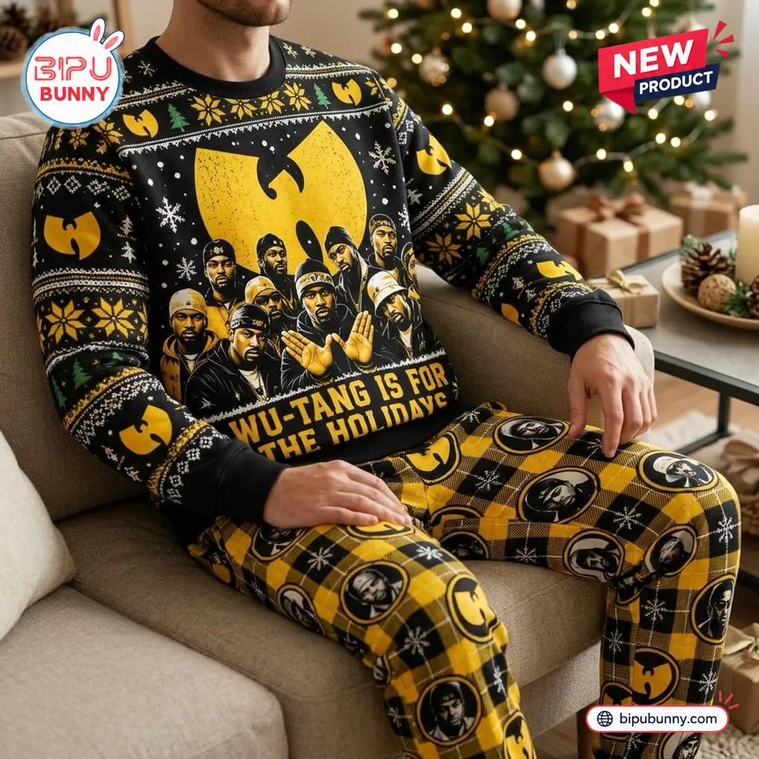 Man relaxing in an armchair wearing matching Wu-Tang Clan sweater and jogger pants set