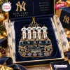 Top-down view of a golden New York Yankee Greatness Christmas Ornament inside a blue gift box.