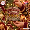 Close-up of a burgundy and gold Christmas ornament featuring four football players and text about Redskins Greatness on a tree.