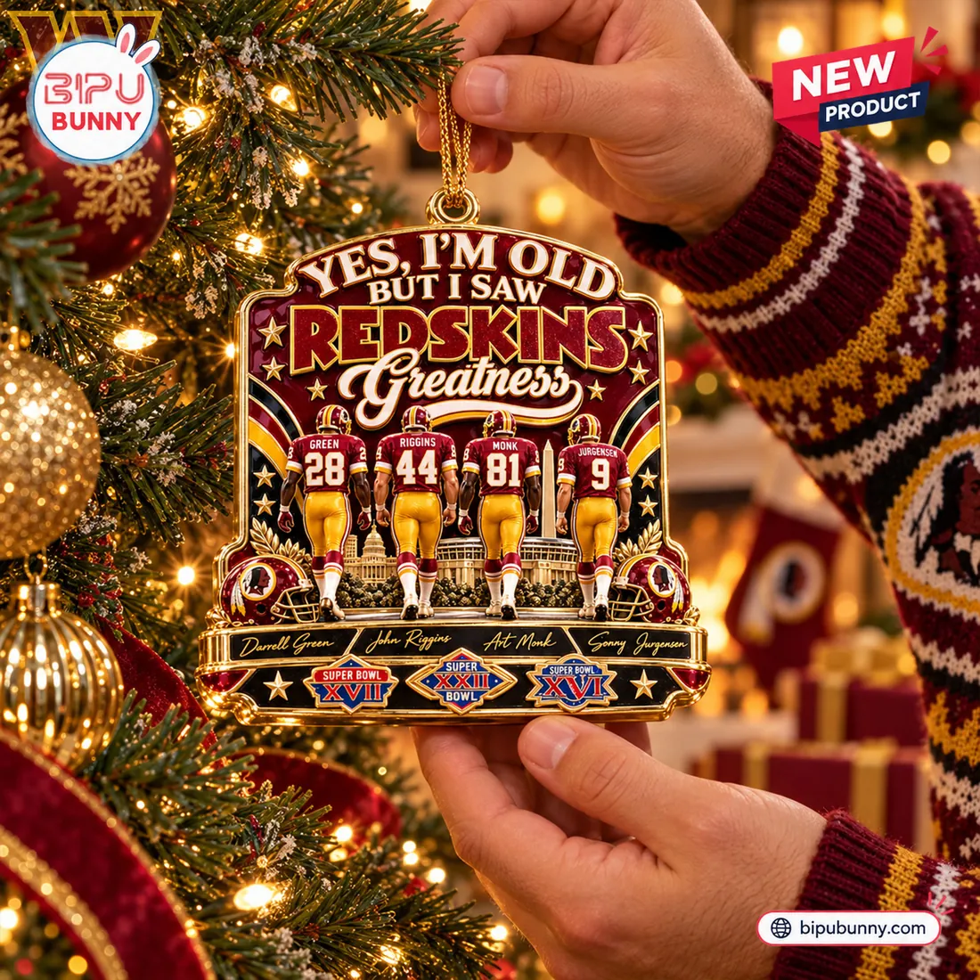 Washington Redskins greatness holiday ornament hanging from evergreen bough
