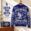 Front view of a blue Zeta Phi Beta 1920 ugly Christmas sweater featuring a dove and snowflakes.