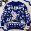 Front view of a blue Zeta Phi Beta 1920 Ugly Christmas Sweater featuring a white dove and gift boxes.