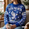 Front view of a blue Zeta Phi Beta 1920 ugly Christmas sweater featuring a white dove and snowflake patterns.