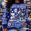 Front view of a blue Zeta Phi Beta Christmas sweater with textured white holiday patterns and a cartoon dove.