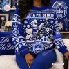 Front view of the Zeta Phi Beta Blue Cable Knit Christmas Sweater featuring holiday motifs and lettering.
